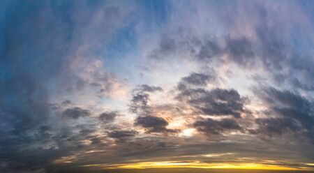 Fantastic dark thunderclouds at sunrise