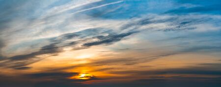 Fantastic dark thunderclouds at sunriseの写真素材