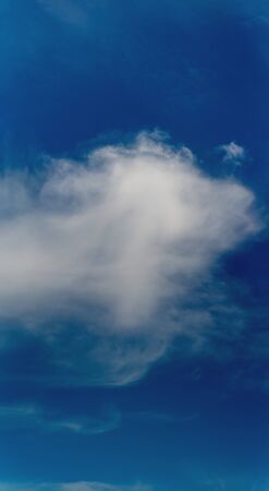 Fantastic soft clouds against blue sky, natural compositionの写真素材