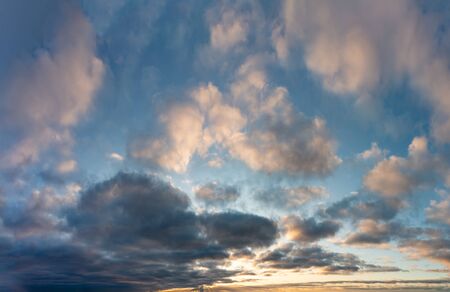 Fantastic dark blue thunderclouds at sunrise, natural compositionの写真素材