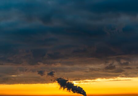 Fantastic dark blue thunderclouds at sunrise, natural compositionの写真素材