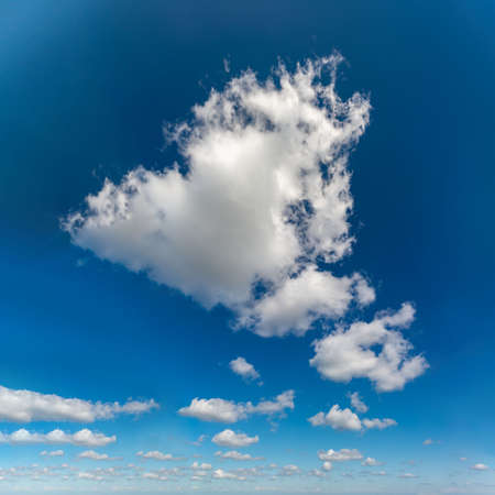 Fantastic clouds against blue skyの写真素材