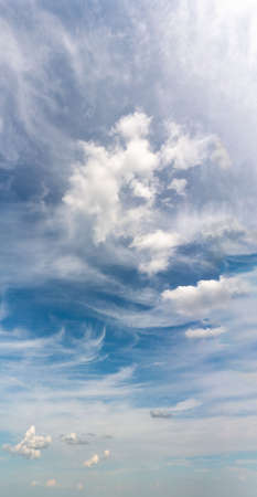 Fantastic clouds against blue sky, panoramaの写真素材