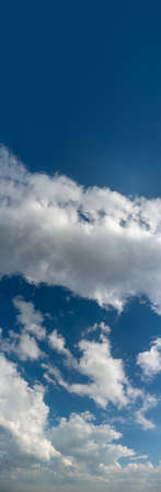 Fantastic clouds against blue sky, panoramaの写真素材
