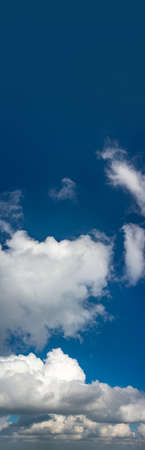 Fantastic clouds against blue sky, panoramaの写真素材