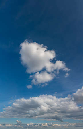 Fantastic clouds against blue sky, panoramaの写真素材