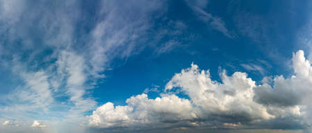 Fantastic soft clouds against blue sky, natural composition - panorama