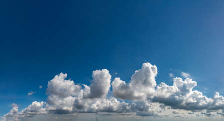 Fantastic soft clouds against blue sky, natural composition - panoramaの写真素材