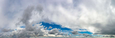 Fantastic soft clouds, natural sky composition, wide panoramaの写真素材