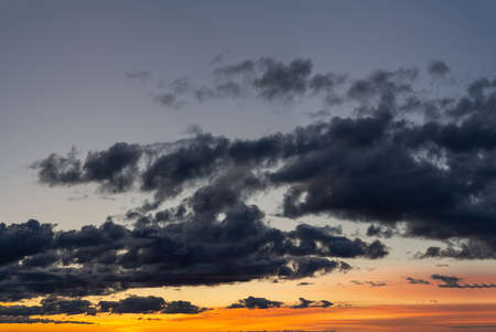 Fantastic thunderclouds at sunriseの写真素材