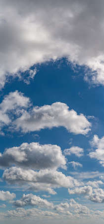 Fantastic clouds against blue sky, panoramaの写真素材