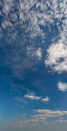Fantastic clouds against blue sky, panoramaの写真素材
