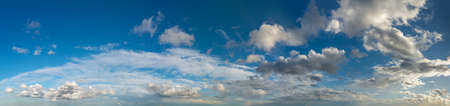 Fantastic soft clouds against blue sky, natural composition - panoramaの写真素材