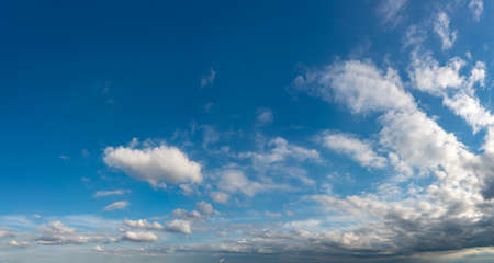 Fantastic soft clouds against blue sky, natural composition - panoramaの写真素材