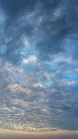 Fantastic soft thunderclouds at sunrise, natural compositionの写真素材