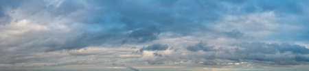 Fantastic soft clouds against blue sky, natural composition - panoramaの写真素材