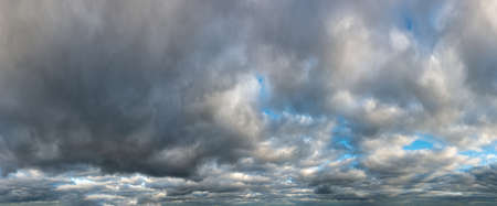 Fantastic soft clouds, natural sky composition, wide panoramaの写真素材