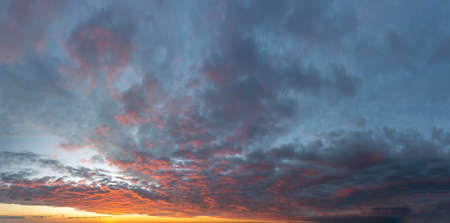 Fantastic soft thunderclouds at sunrise, natural composition