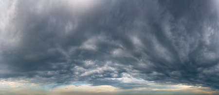 Fantastic soft thunderclouds, natural sky composition, wide panoramaの写真素材