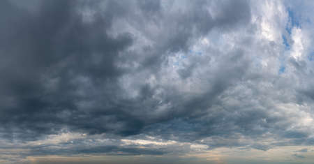 Fantastic soft thunderclouds at sunrise, natural compositionの写真素材