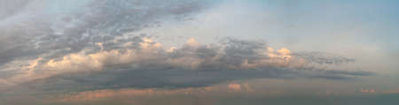 Fantastic soft thunderclouds at sunrise, natural composition