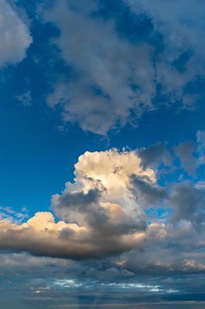 Fantastic soft thunderclouds, natural sky composition, vertical panoramaの写真素材