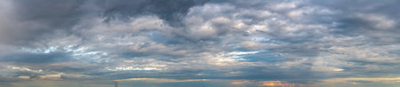 Fantastic soft thunderclouds, natural sky composition, wide panoramaの写真素材