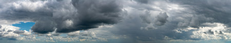 Fantastic soft thunderclouds, natural sky composition, wide panoramaの写真素材