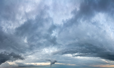 Fantastic soft thunderclouds, natural sky composition, wide panoramaの写真素材