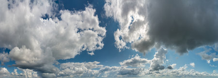 Fantastic soft thunderclouds, natural sky composition, wide panoramaの写真素材