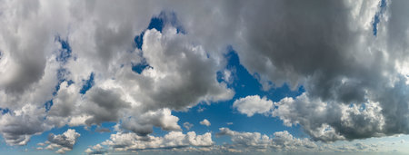 Fantastic soft thunderclouds, natural sky composition, wide panoramaの写真素材