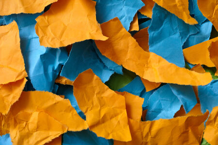 Colorful crumpled and torn, pieces of paper. Paper background.