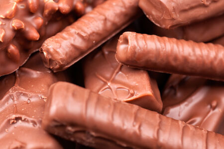Chocolate bars heap. Close-up.の写真素材