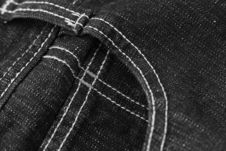 Black denim pocket close-up.の写真素材