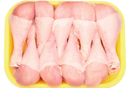 Raw chicken drumsticks close-up.の写真素材
