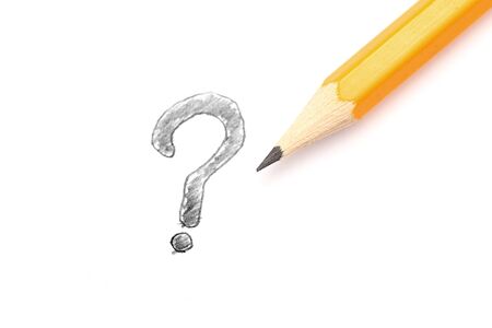 Question mark and pencil on white background. Shallow depth of field. Selective focus. Close-up.の写真素材
