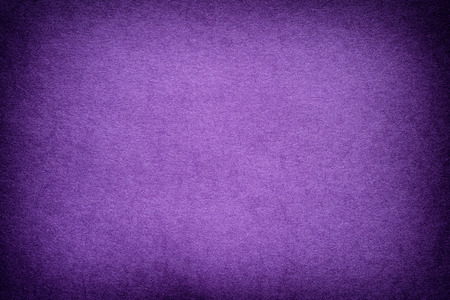 Purple paper background with vignette.の写真素材