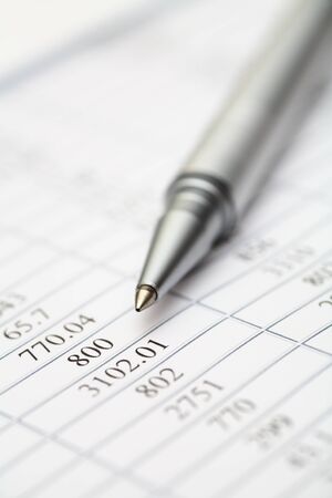 Ballpoint pen on financial statementsの写真素材