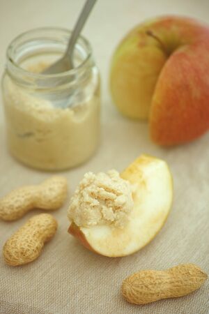 Apples and raw organic homemade peanut butter.