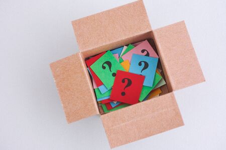 Colorful question marks inside a box. Think outside the box. Concept images. Close up.の写真素材