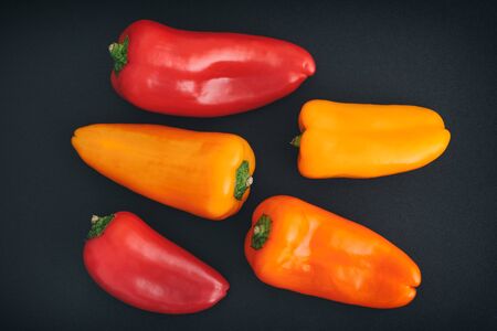 Bell peppers on a black background. Close up.の写真素材