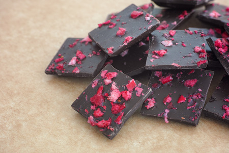 Dark Chocolate With Pieces Of Cranberries. Close up.