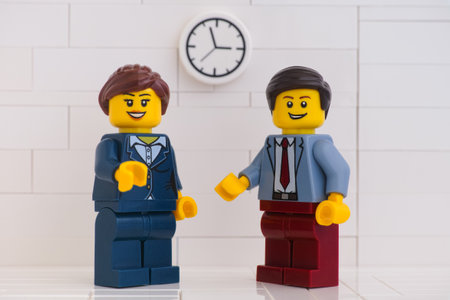 Tambov, Russian Federation - June 3, 2020 Lego minifigure businessmen having a meeting.のeditorial素材