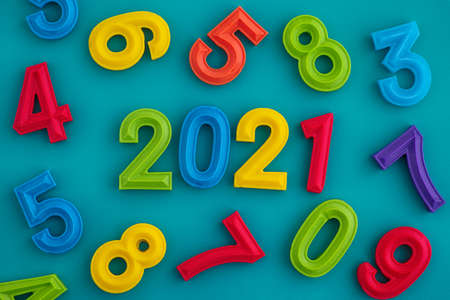 The year 2021 made out of polymer clay numbers with numbers surrounding them. Close up.の写真素材
