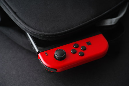 Tambov, Russian Federation - October 21, 2020 Nintendo Switch video game console inside of a black...