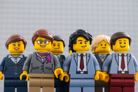 Tambov, Russian Federation - December 19, 2020 Lego businesspeople minifigures standing and looking...