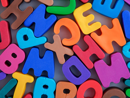 A group of colorful polymer clay letters. close up.の写真素材