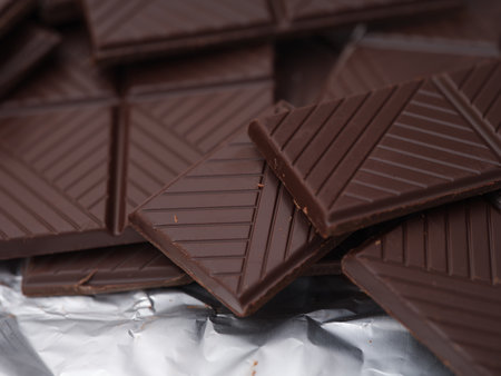 Pieces of organic dark chocolate. Close up.の写真素材