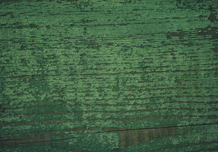 An old green wooden background. Close up.の写真素材