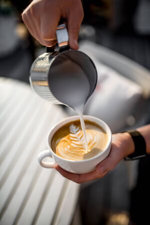 Coffee latte art at sunny dayの写真素材